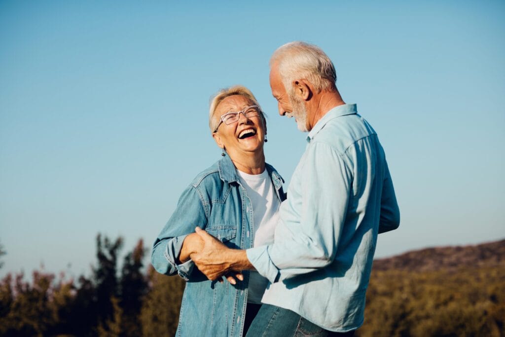 woman man outdoor senior couple happy lifestyle retirement toget